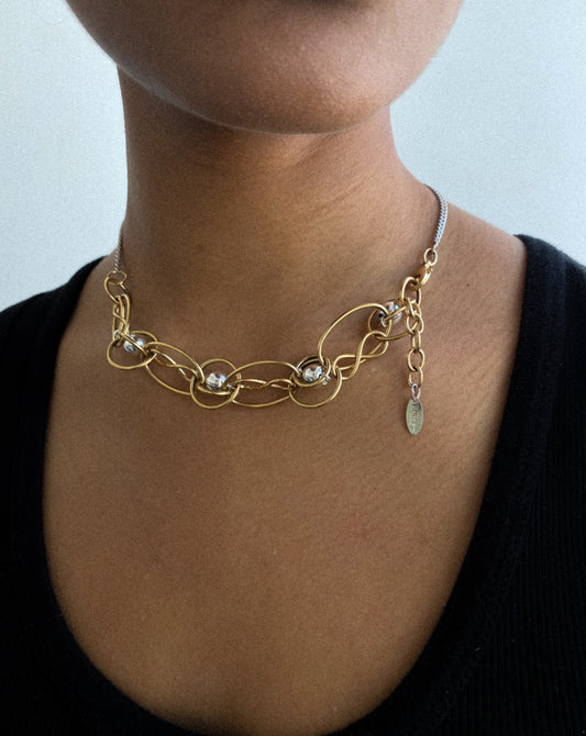 Necklace - intertwined links plated in antique gold